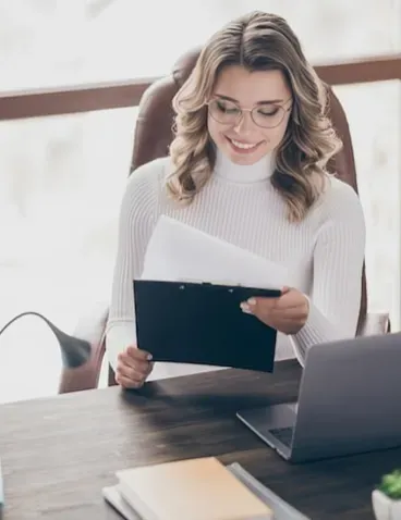 A tax professional reviewing client documents